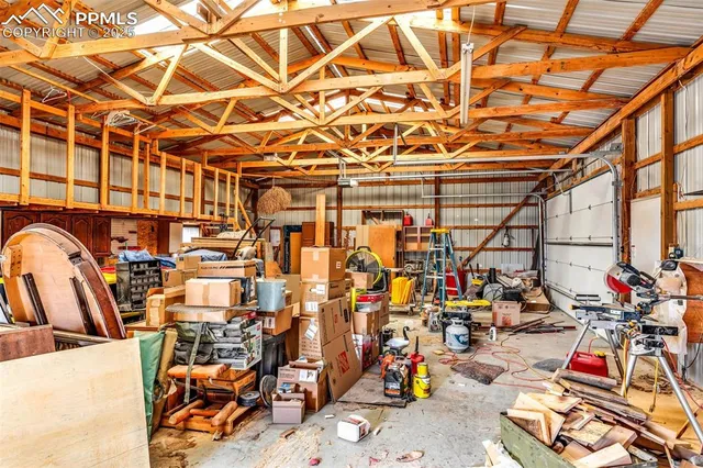 a view of gym with large trees