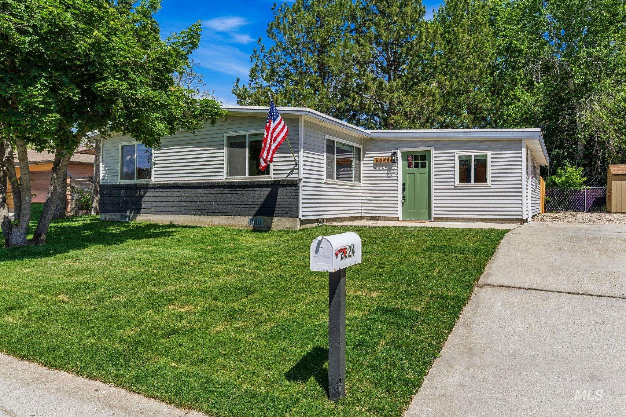 2224 Rachel Circle Boise, ID 83706 - Photo 3 of 50 Ranch-style exterior with light gray horizontal siding and a dark gray brick foundation