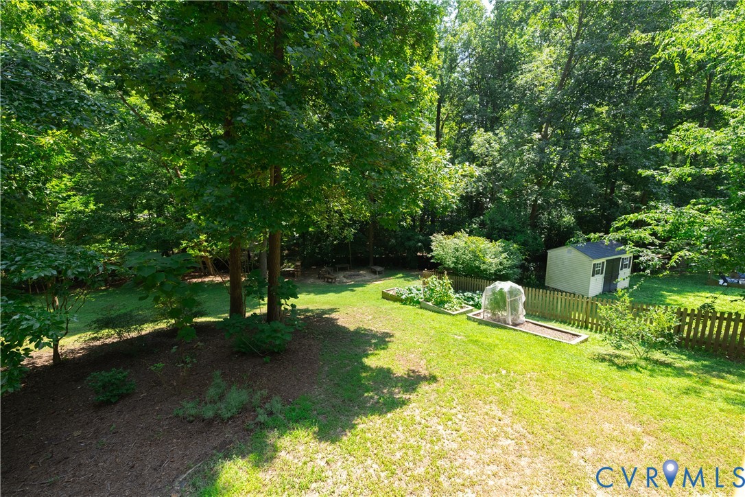 4501 Foxwood Road Chester, VA 23831 - Photo 31 of 42 Expansive grassy yard featuring mature trees, rais