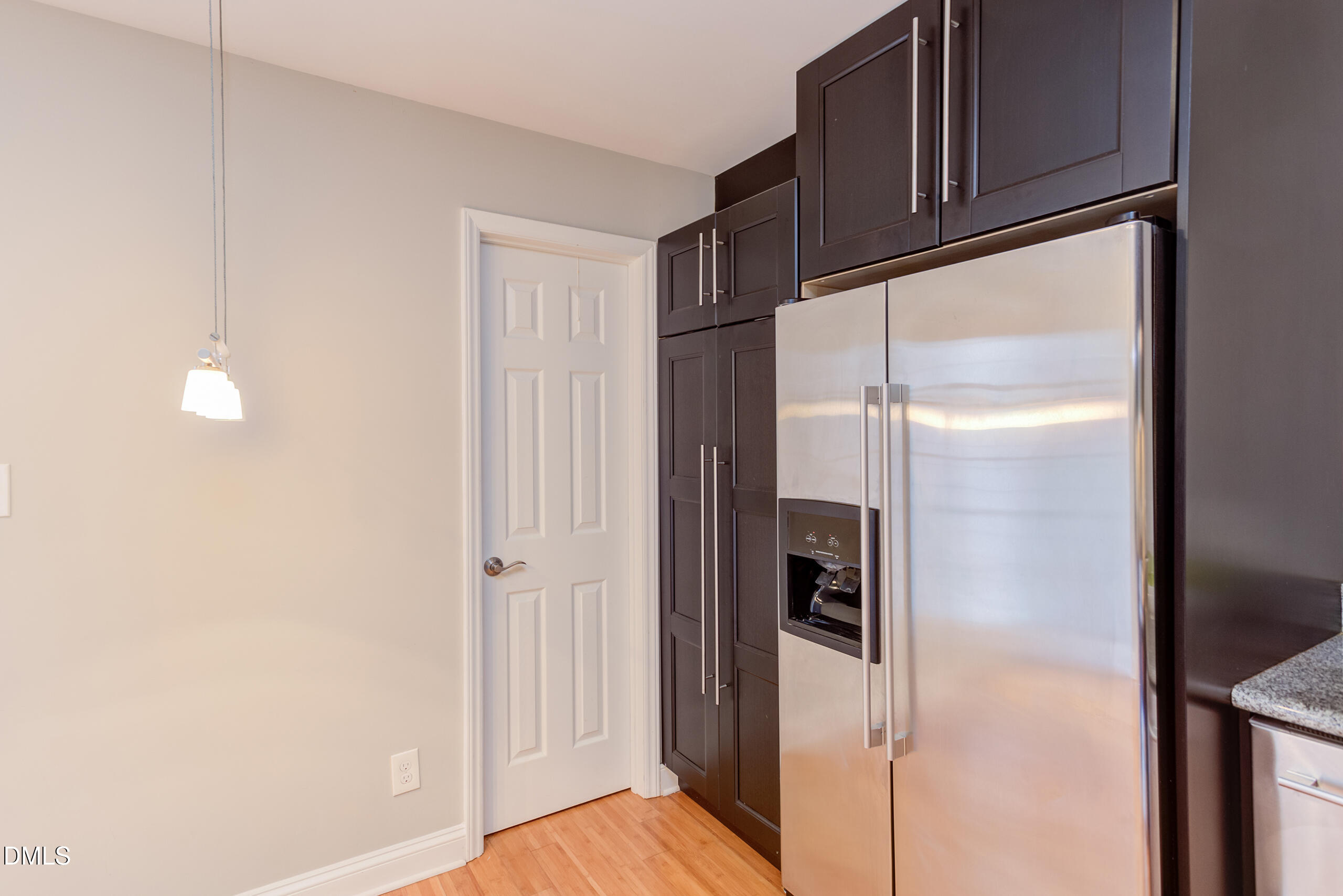 2556 Noble Road Raleigh, NC 27608 - Photo 12 of 29 a view of walk in closet with empty racks