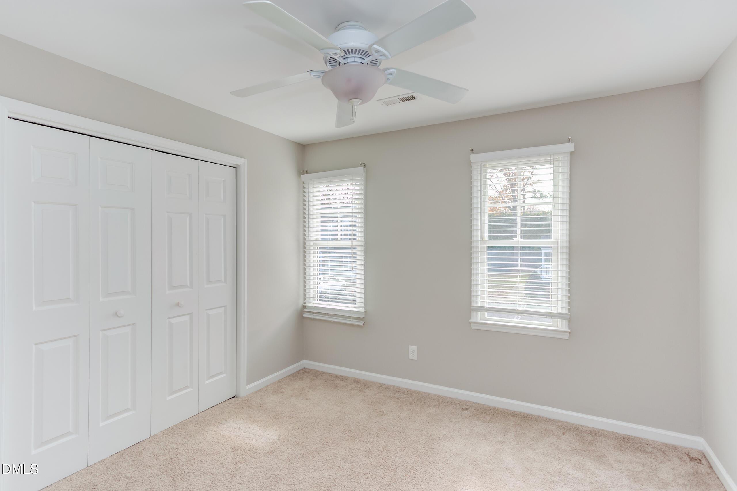 2556 Noble Road Raleigh, NC 27608 - Photo 19 of 29 a view of an empty room with a window