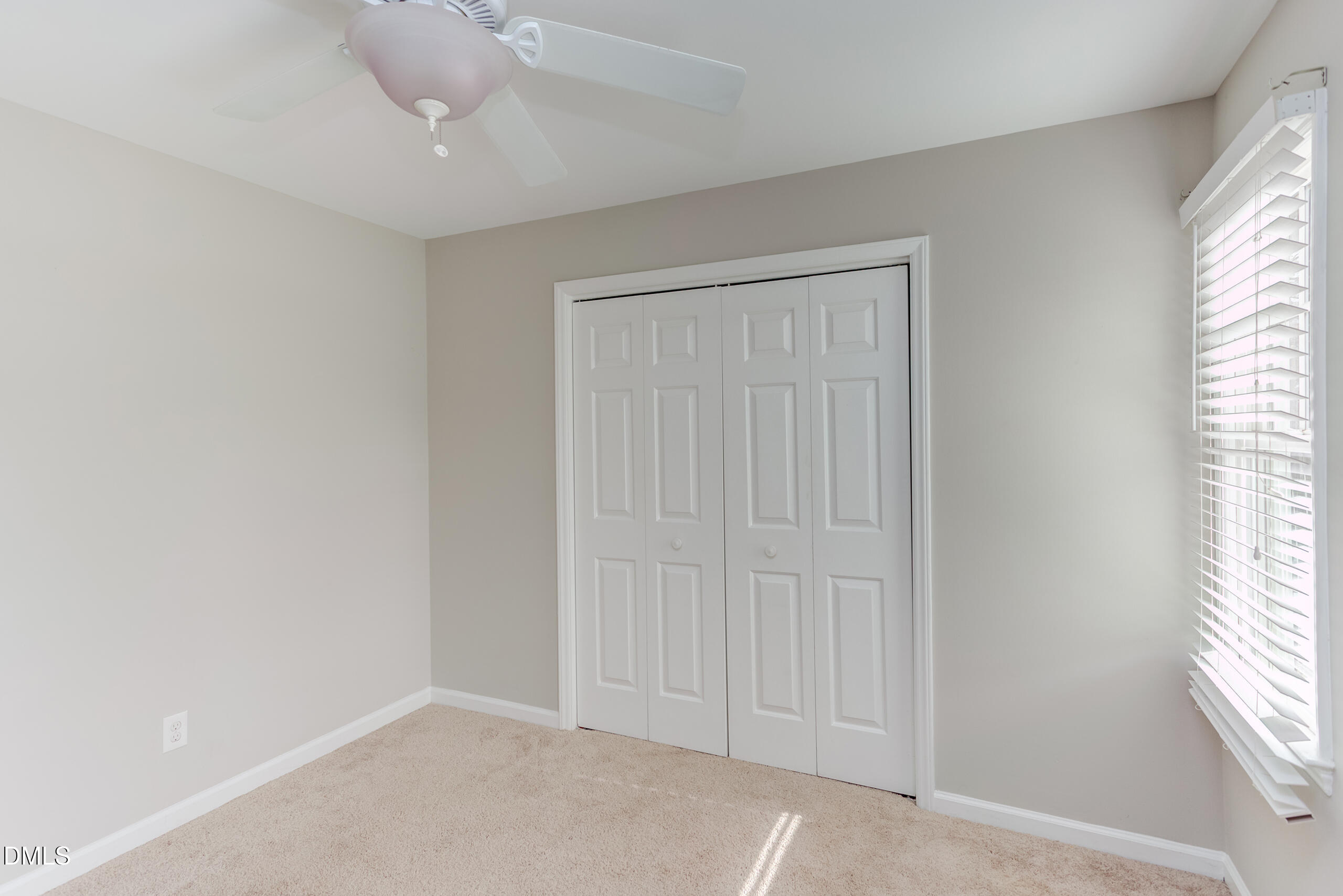 2556 Noble Road Raleigh, NC 27608 - Photo 20 of 29 an empty room with windows