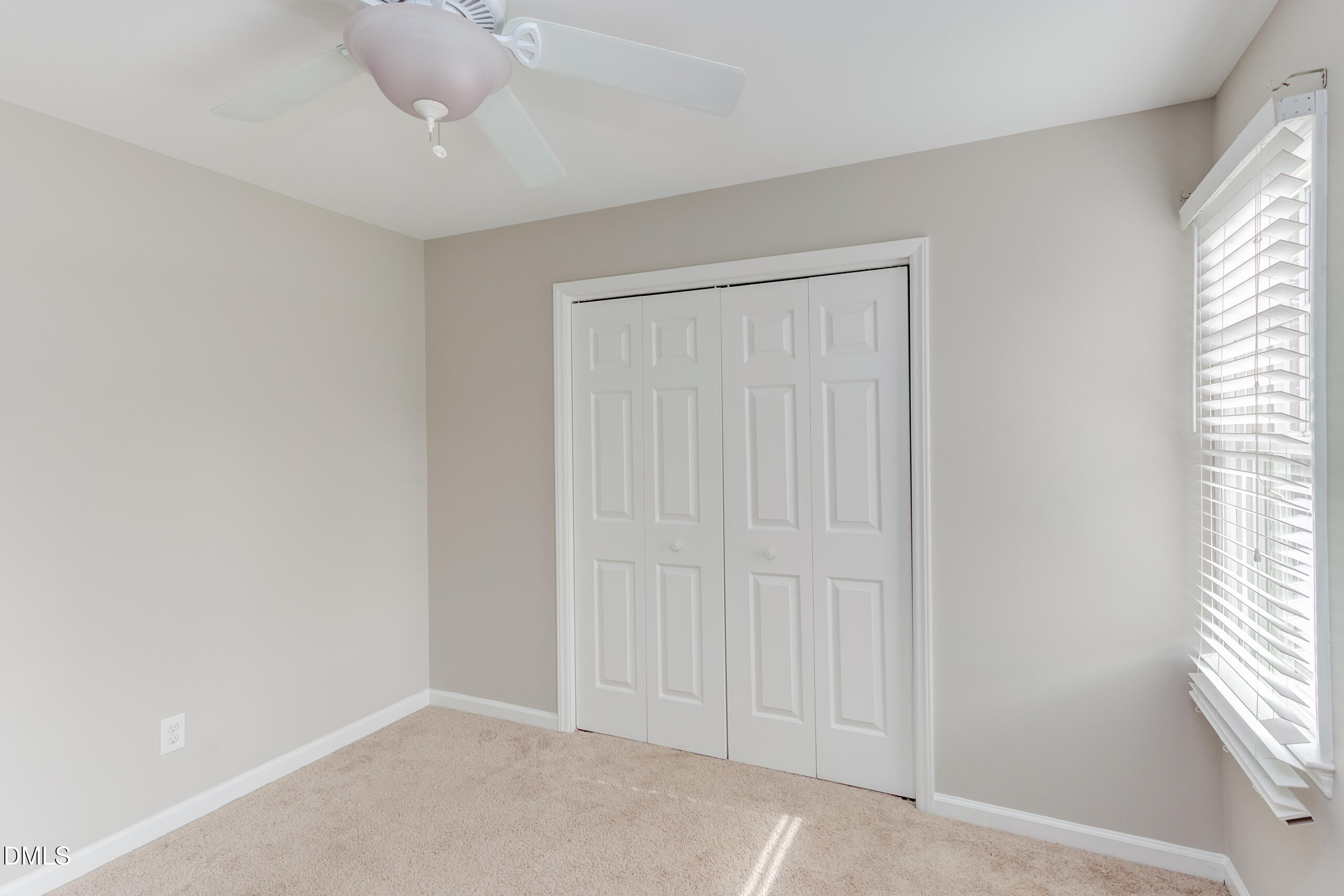 2556 Noble Road Raleigh, NC 27608 - Photo 21 of 29 an empty room with windows