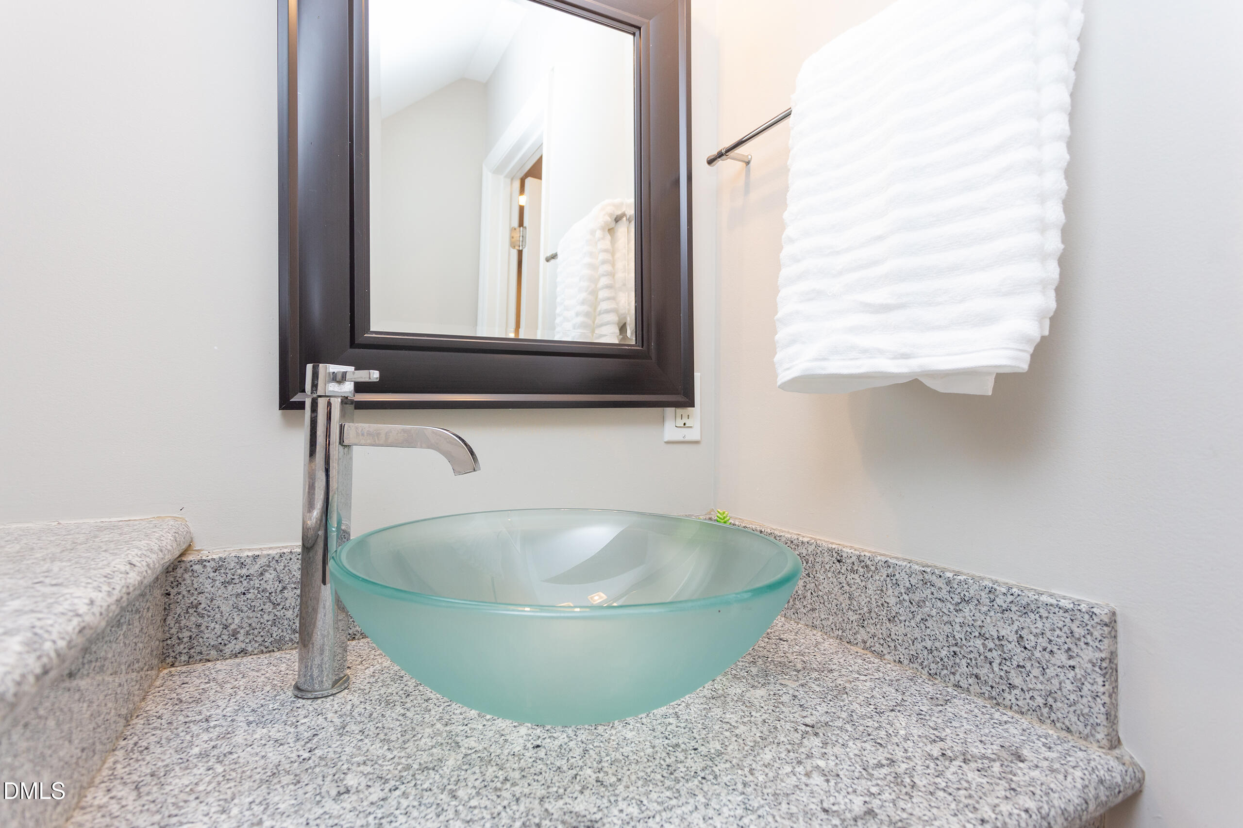 2556 Noble Road Raleigh, NC 27608 - Photo 24 of 29 a room with a sink and a mirror