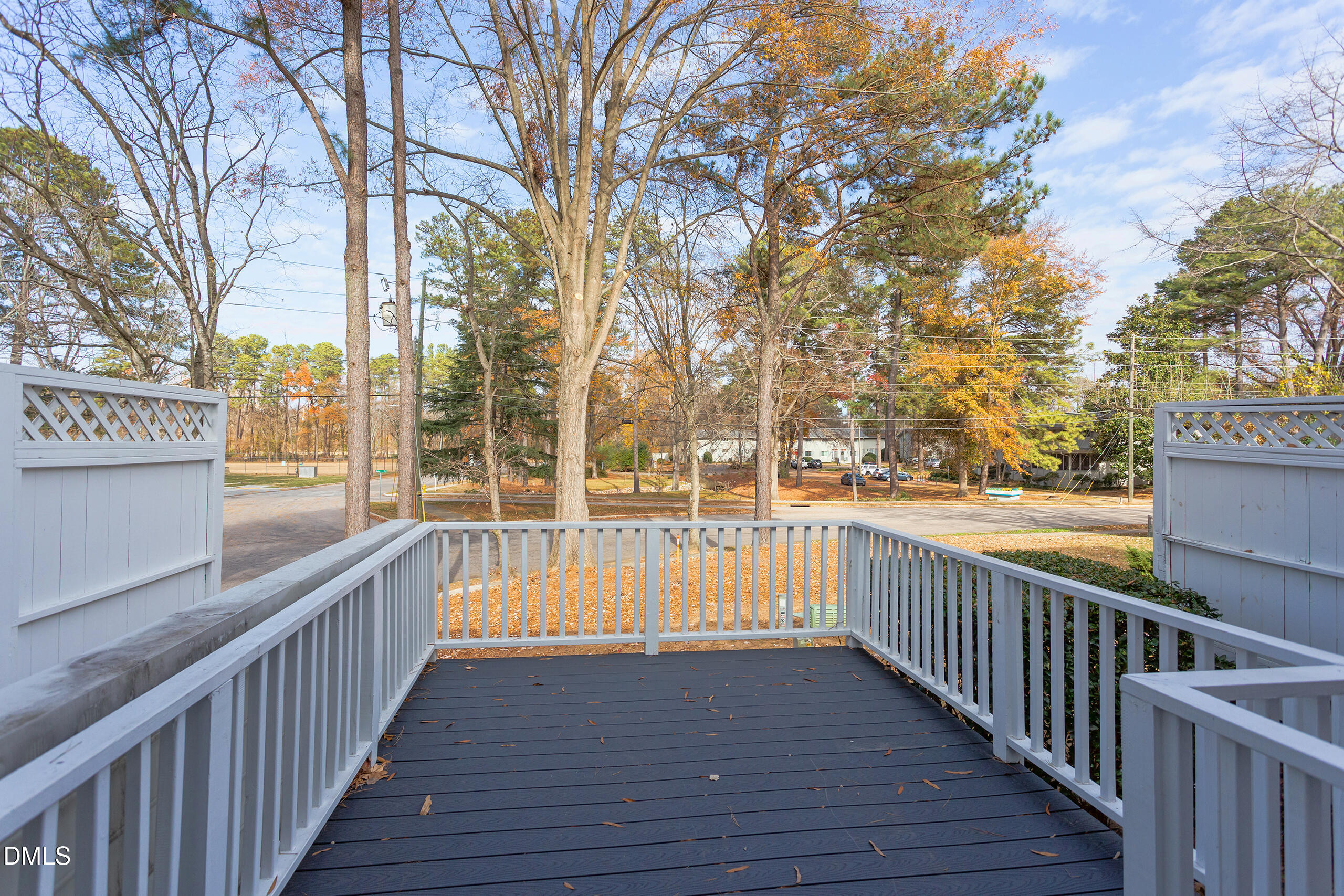 2556 Noble Road Raleigh, NC 27608 - Photo 25 of 29 a view of a street with wooden stairs and fence