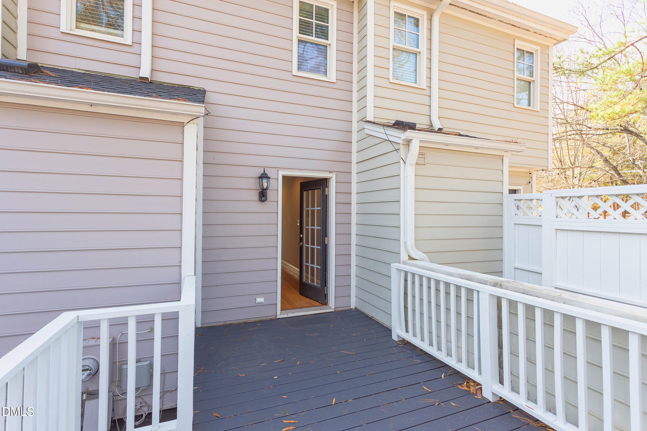 2556 Noble Road Raleigh, NC 27608 - Photo 28 of 29 a view of a house with a small deck