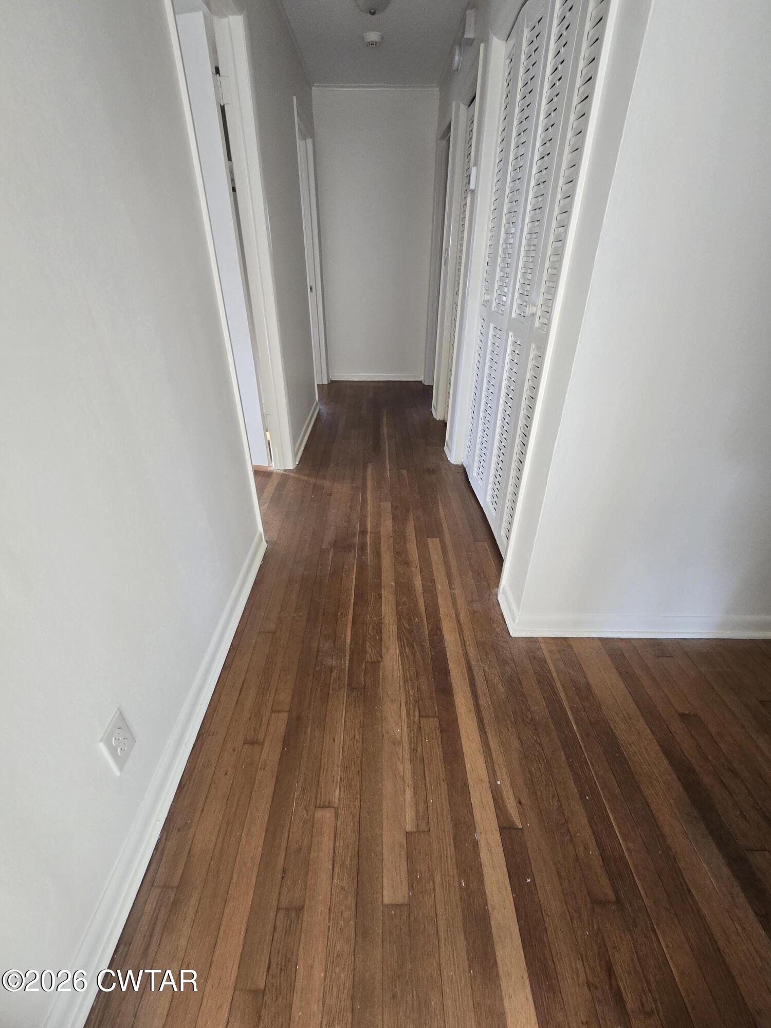 69 Lilac Lane Jackson, TN 38301 - Photo 13 of 23 a view of wooden floor in a room
