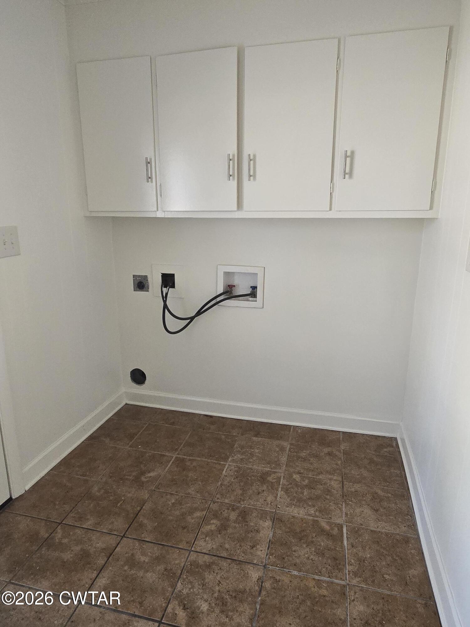 69 Lilac Lane Jackson, TN 38301 - Photo 21 of 23 a view of room with cabinets