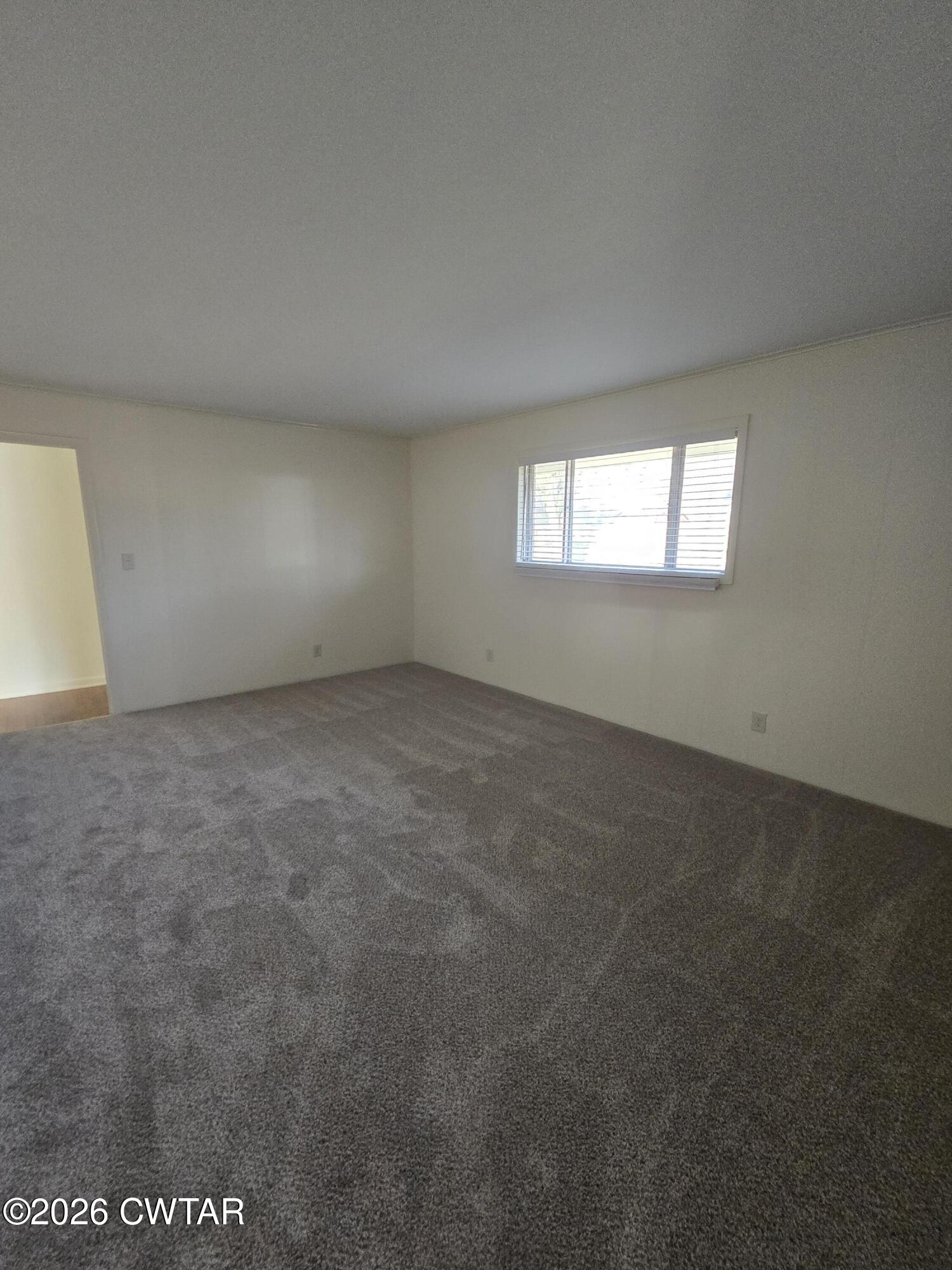 69 Lilac Lane Jackson, TN 38301 - Photo 6 of 23 an empty room with windows