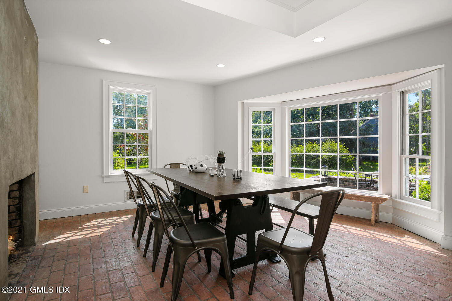 61 River Road Weston, CT 06883 - Photo 11 of 35 a view of a dining room with furniture and window