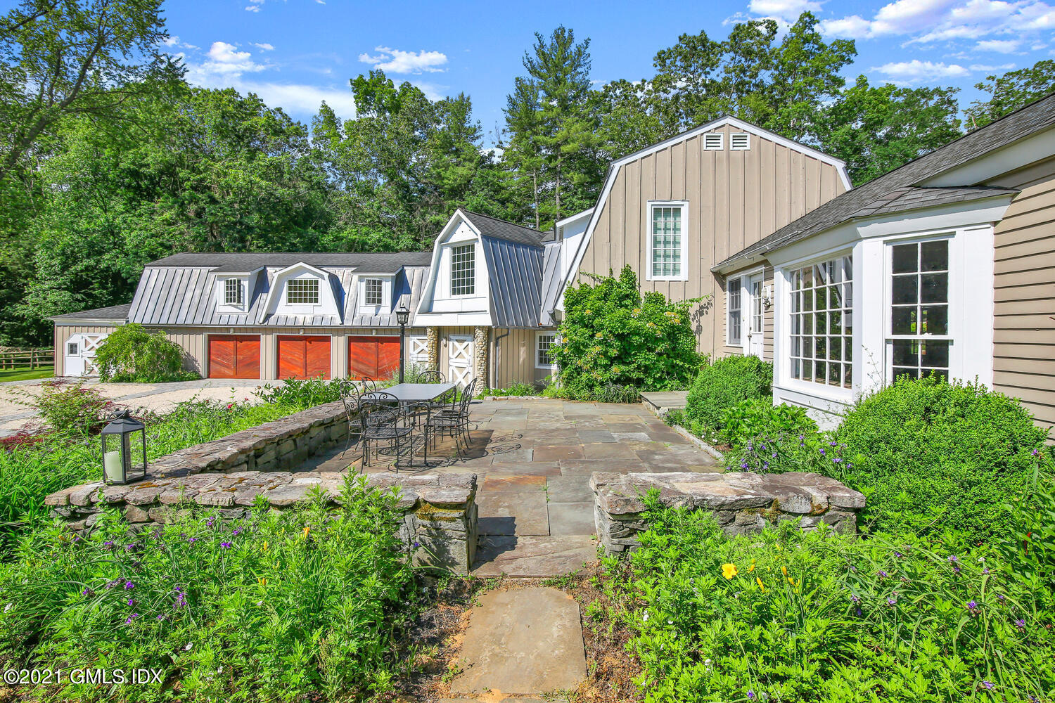 61 River Road Weston, CT 06883 - Photo 2 of 35 front view of a house with a yard