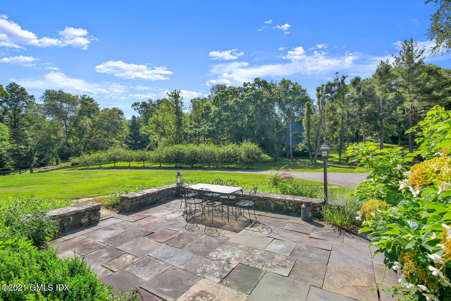 61 River Road Weston, CT 06883 - Photo 4 of 35 a view of a golf course with a swimming pool