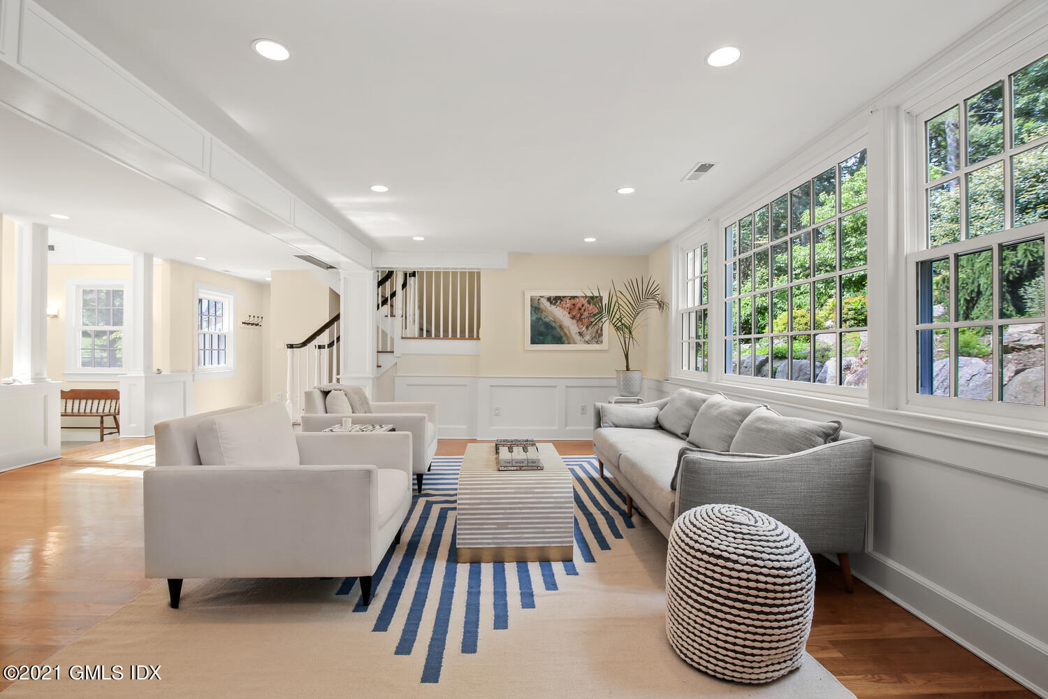 61 River Road Weston, CT 06883 - Photo 8 of 35 a living room with furniture and a large window