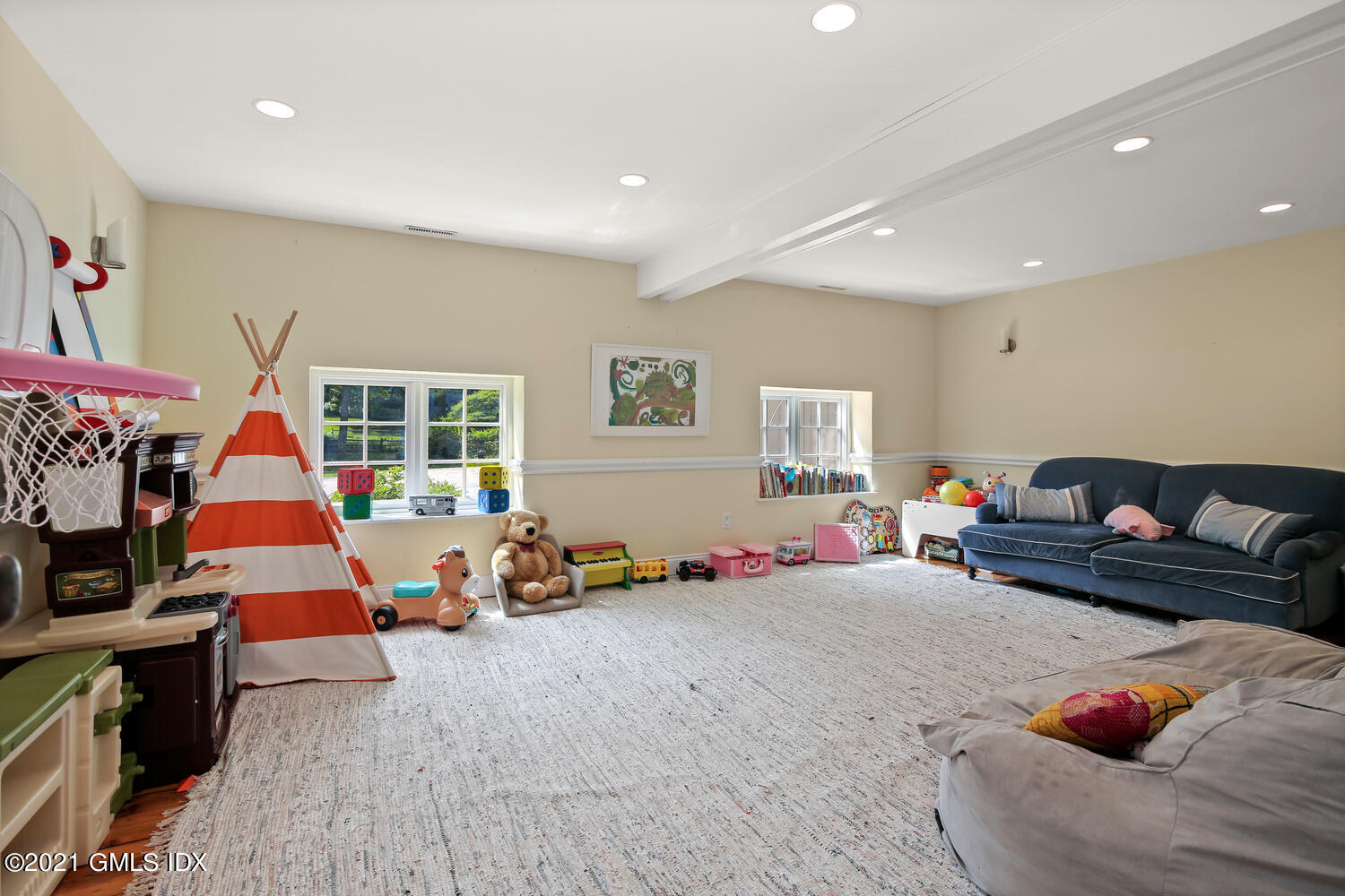 61 River Road Weston, CT 06883 - Photo 10 of 35 a living room with furniture and a couch