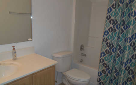 87276 Lents Road Yulee, FL 32097 - Photo 9 of 11 a bathroom with a sink toilet and shower