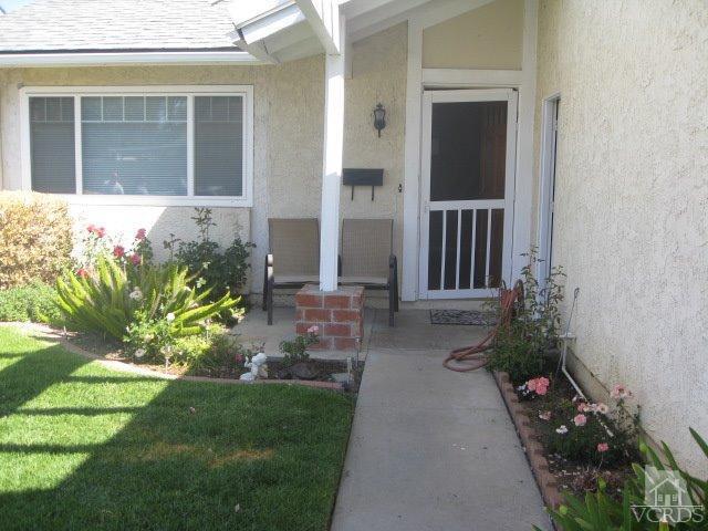 13343 Laurelhurst Road Moorpark, CA 93021 - Photo 2 of 36 a front view of a house with a yard