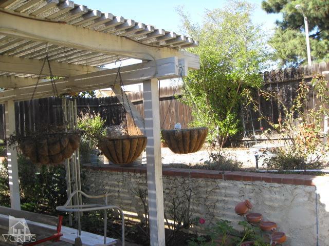 13343 Laurelhurst Road Moorpark, CA 93021 - Photo 4 of 36 a view of a chairs and table in a patio