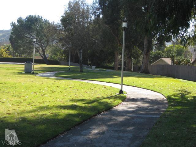 13343 Laurelhurst Road Moorpark, CA 93021 - Photo 8 of 36 a view of a swimming pool with a yard