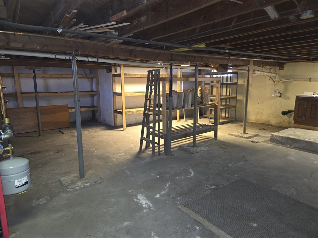 18 Fairview Avenue Dudley, MA 01571 - Photo 14 of 19 a view of a room with gym equipment