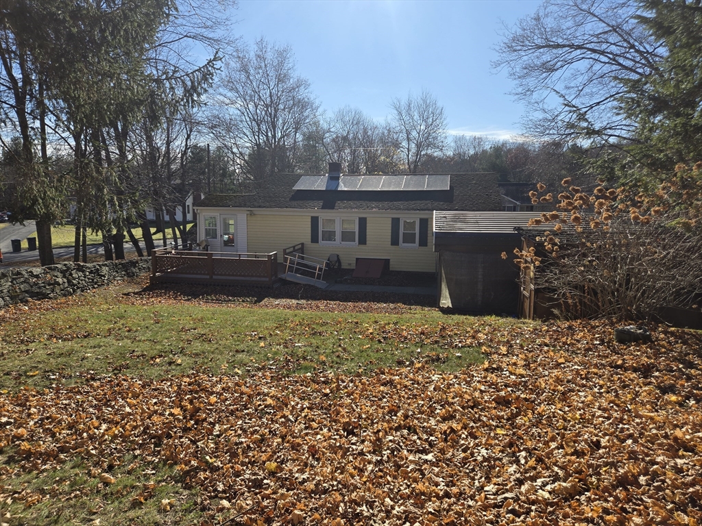 18 Fairview Avenue Dudley, MA 01571 - Photo 4 of 19 front view of a house with a yard