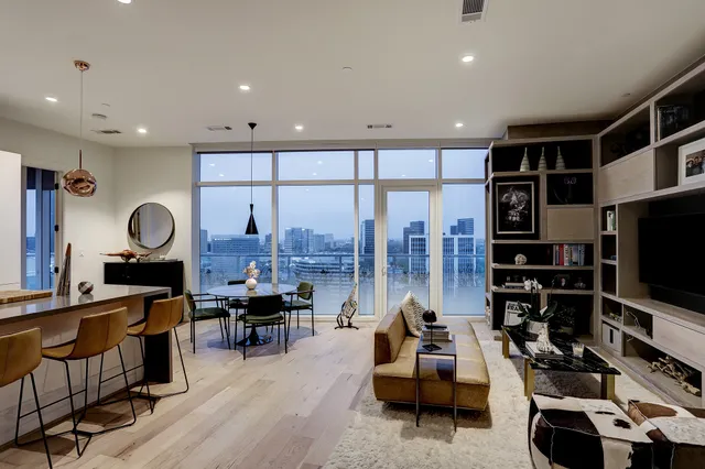 a room with furniture and a flat screen tv