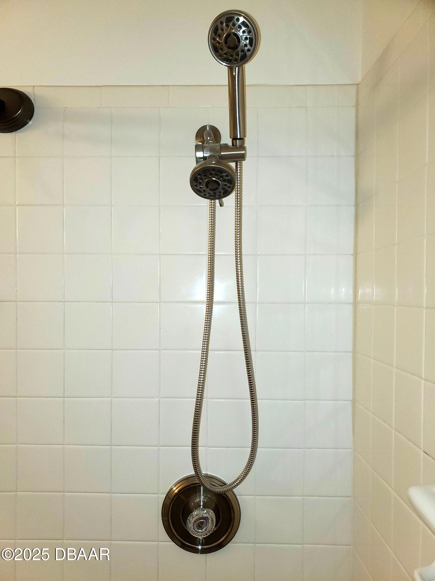 165 White Fawn Drive, Unit MB Daytona Beach, FL 32114 - Photo 25 of 34 165-MB-bath-showerhead