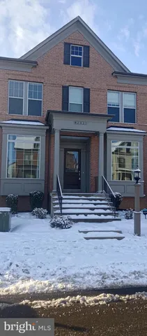 a view of a house with entrance gate