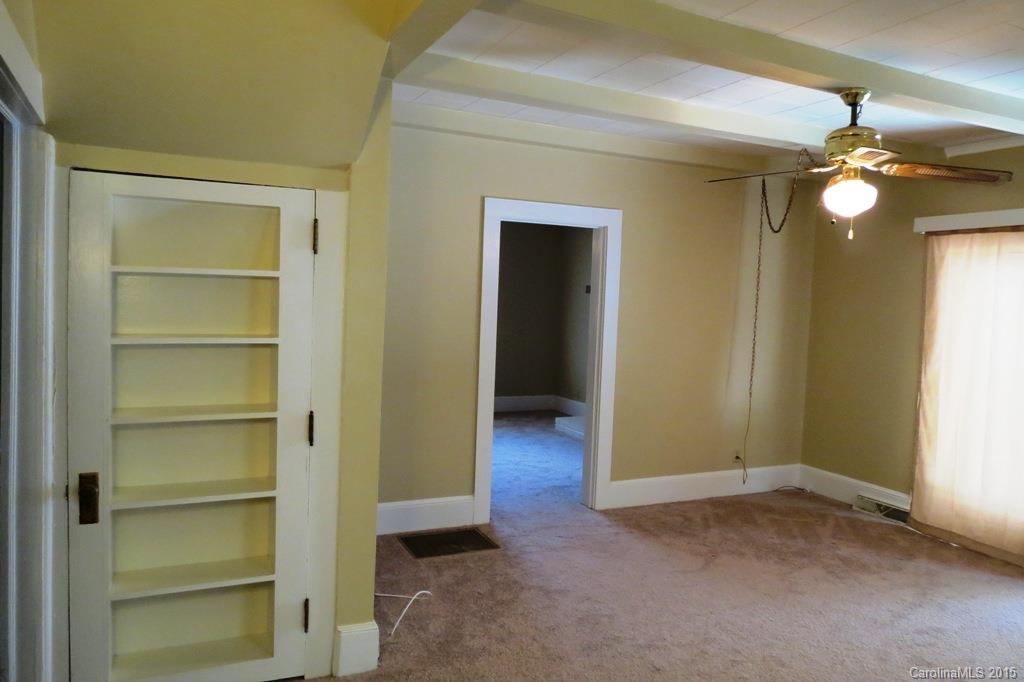 207 Rogers Lake Road Kannapolis, NC 28081 - Photo 11 of 21 a view of a livingroom with a chandelier