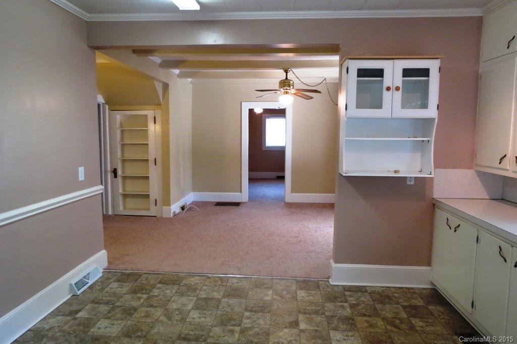 207 Rogers Lake Road Kannapolis, NC 28081 - Photo 14 of 21 a view of a hallway with wooden shelves