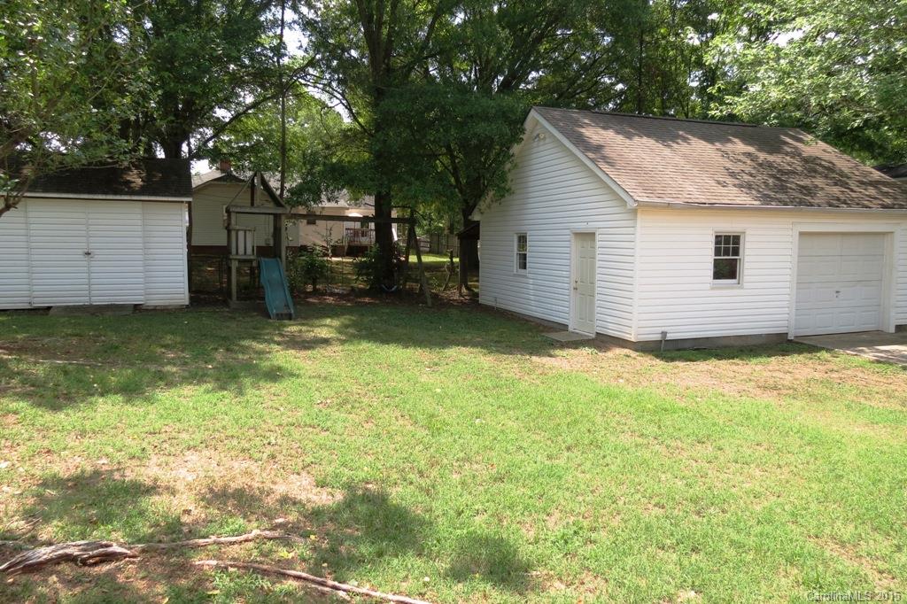 207 Rogers Lake Road Kannapolis, NC 28081 - Photo 3 of 21 a view of a backyard with a garden