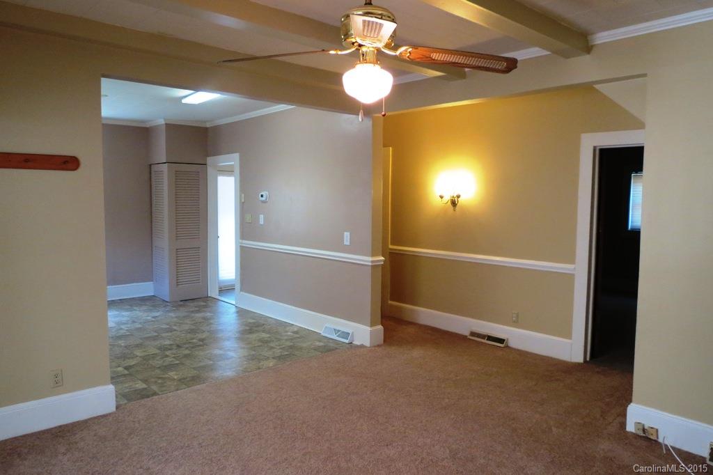 207 Rogers Lake Road Kannapolis, NC 28081 - Photo 10 of 21 a view of empty room with wooden floor