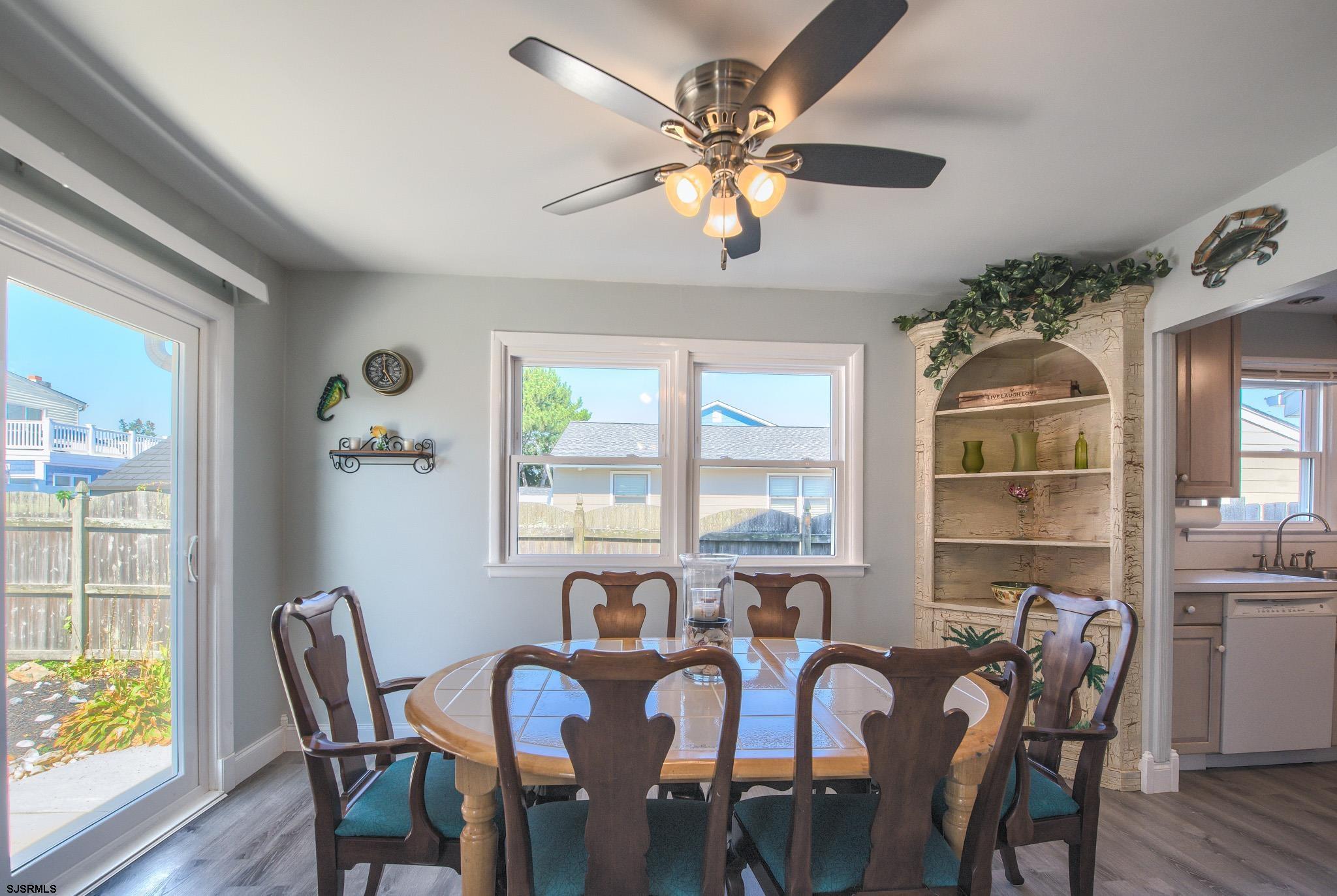 2 Surf Lane Brigantine, NJ 08203 - Photo 11 of 42 a view of a dining room with furniture window and outside view