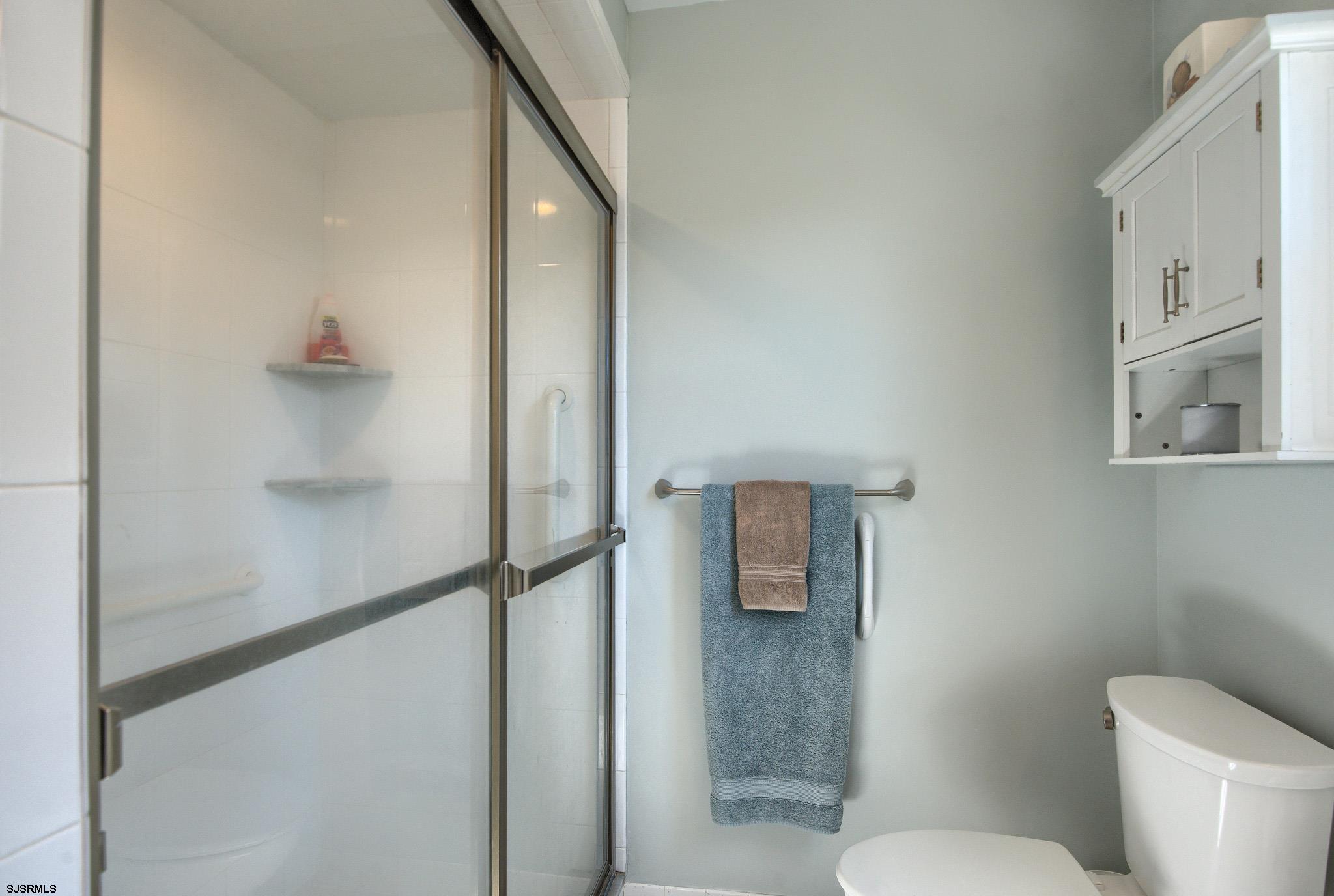 2 Surf Lane Brigantine, NJ 08203 - Photo 21 of 42 a bathroom with a toilet and a shower