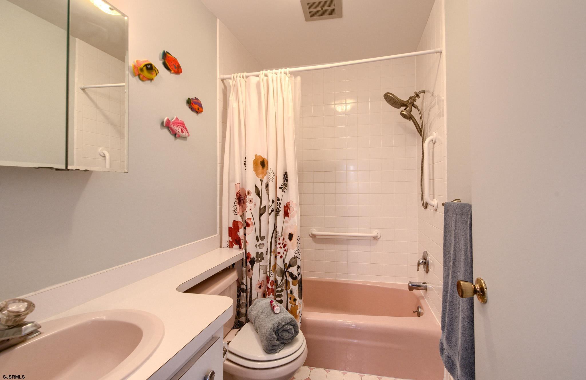 2 Surf Lane Brigantine, NJ 08203 - Photo 24 of 42 a bathroom with a bathtub and a shower