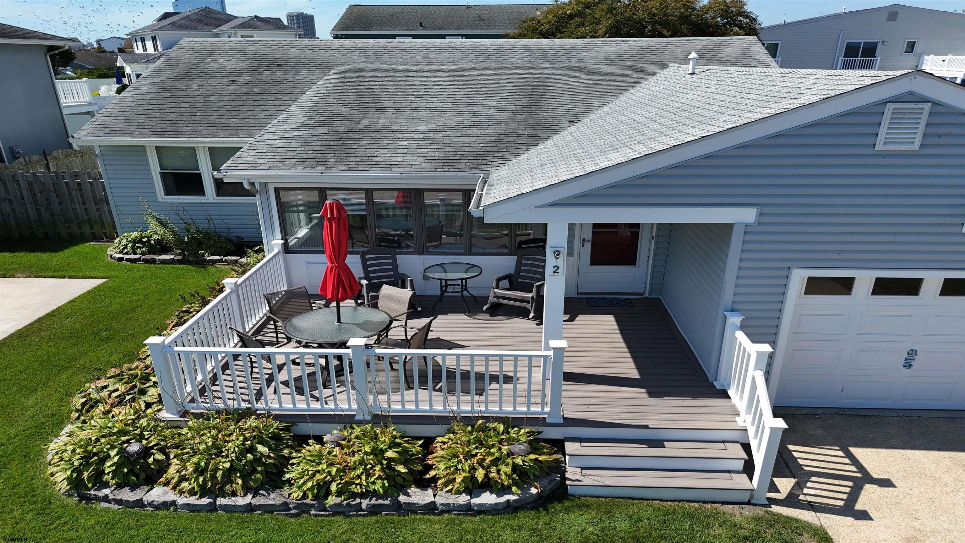 2 Surf Lane Brigantine, NJ 08203 - Photo 33 of 42 a view of a house with backyard and porch