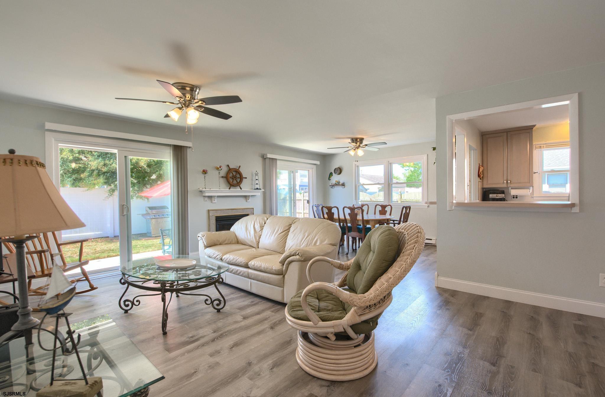 2 Surf Lane Brigantine, NJ 08203 - Photo 9 of 42 a living room with furniture or couch and a potted plant