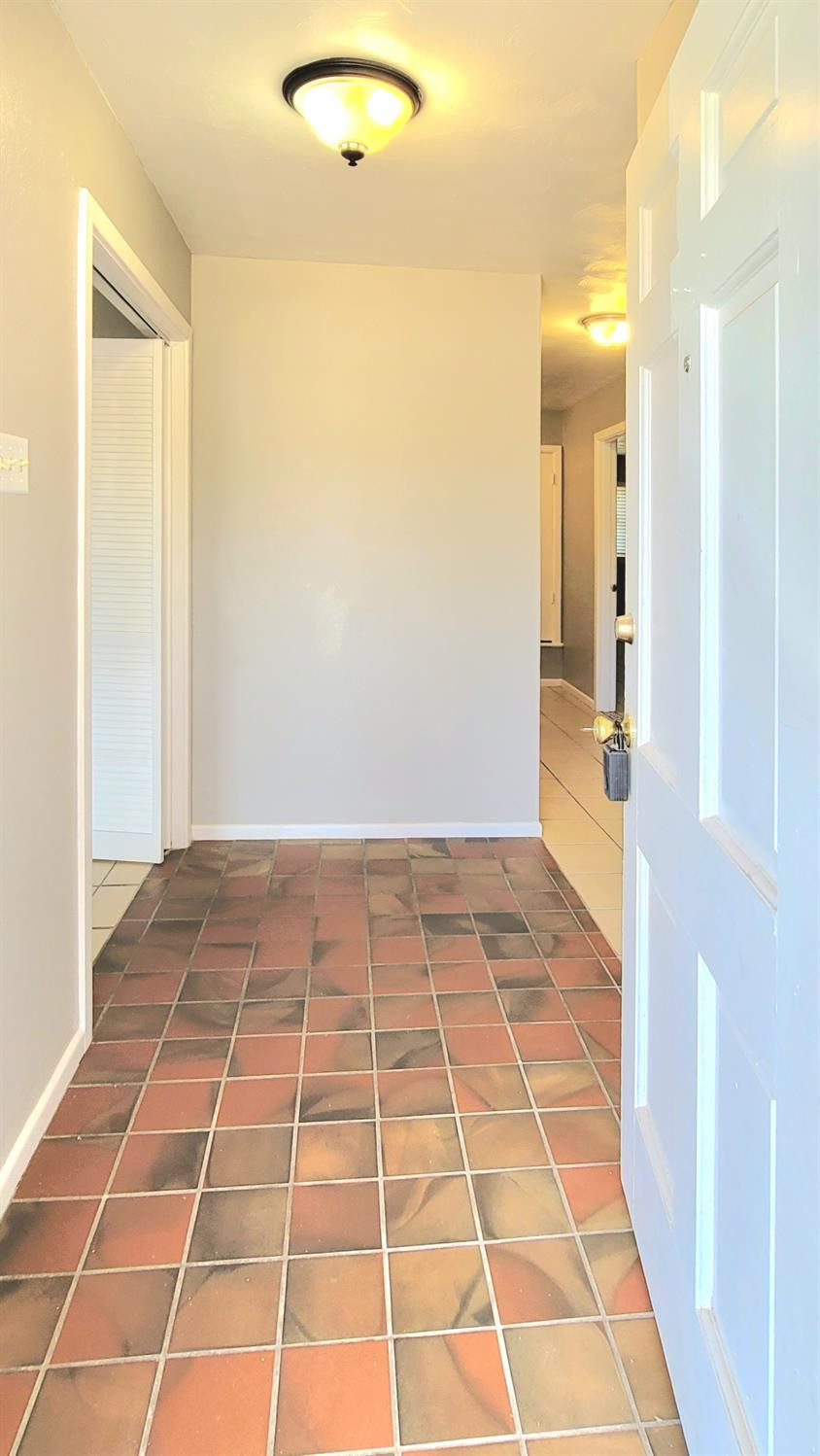 5430 13th Street Lubbock, TX 79416 - Photo 2 of 26 a view of a living room with a rug