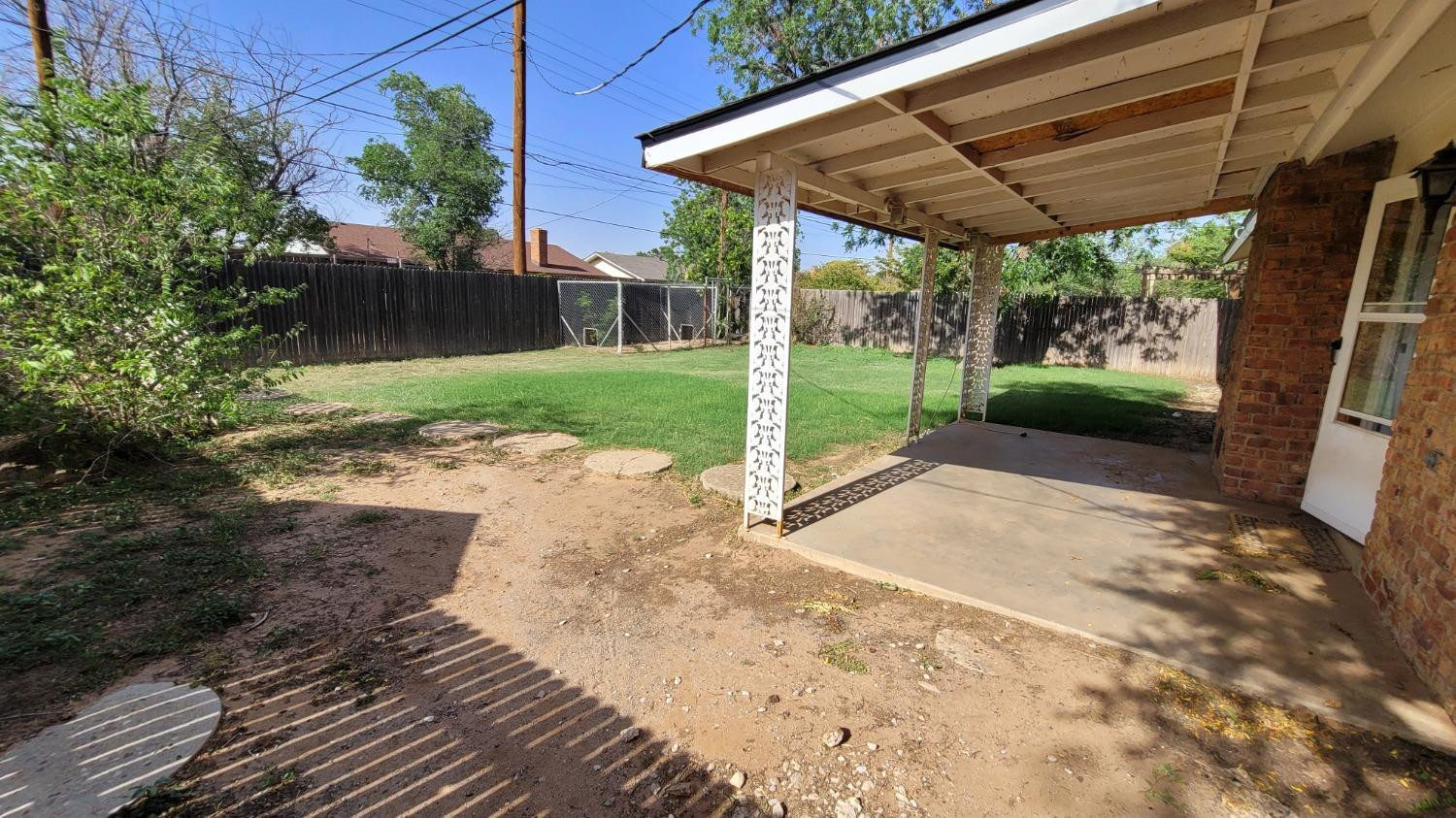 5430 13th Street Lubbock, TX 79416 - Photo 24 of 26 a view of a backyard with garden