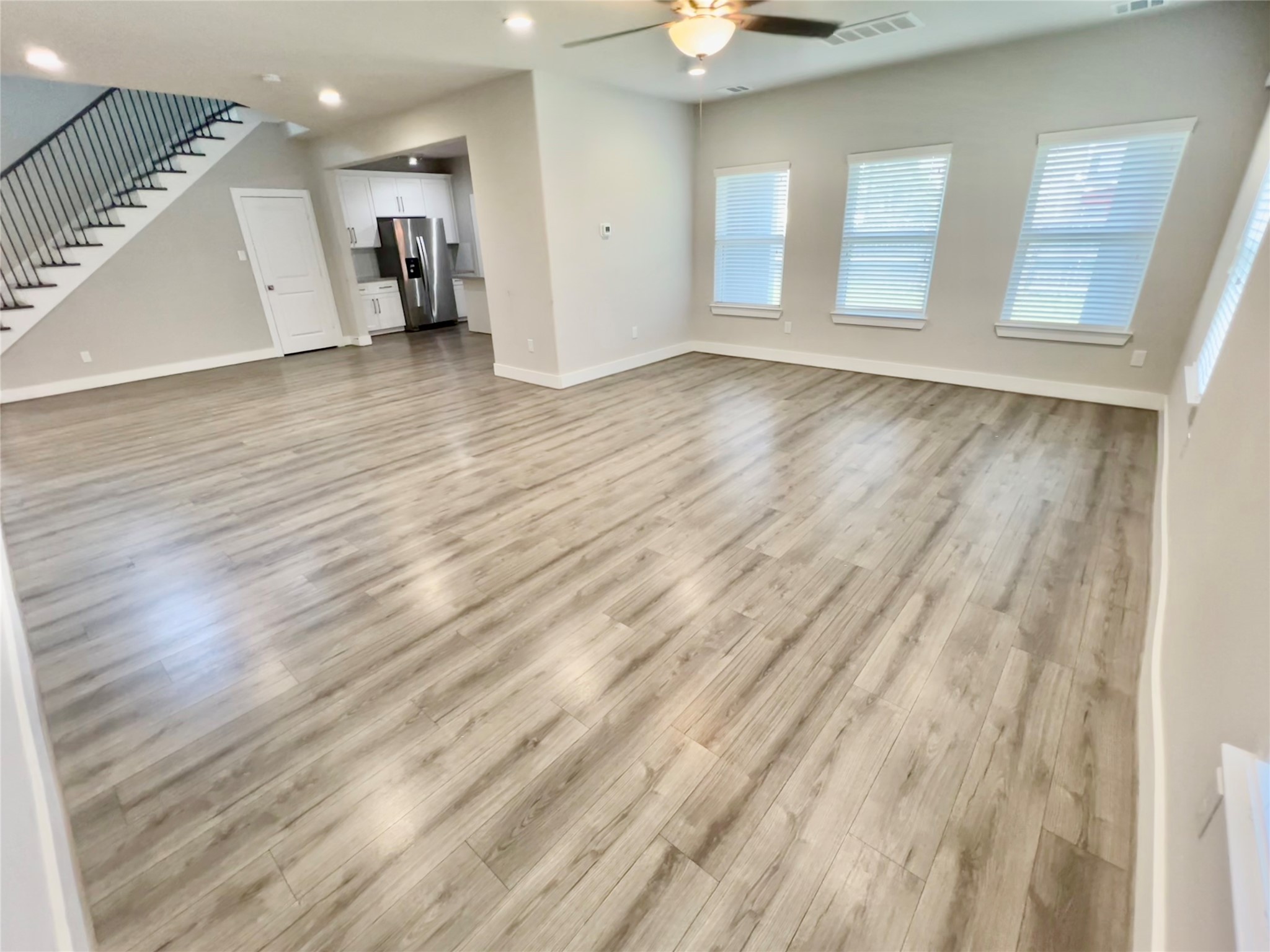 4301 Clover Street Houston, TX 77051 - Photo 13 of 32 wooden floor in an empty room with a window