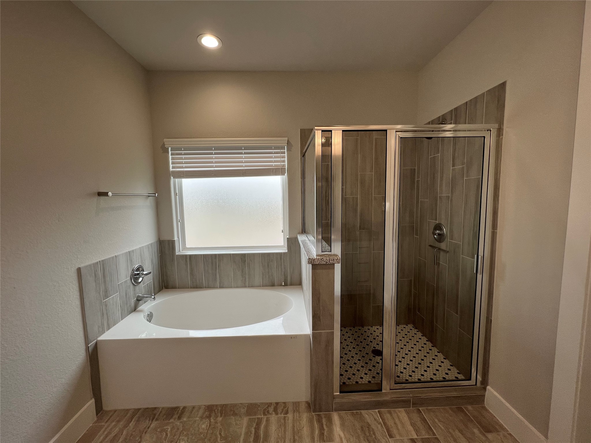 4301 Clover Street Houston, TX 77051 - Photo 19 of 31 Soak in the garden tub. Standing shower for a quick start.