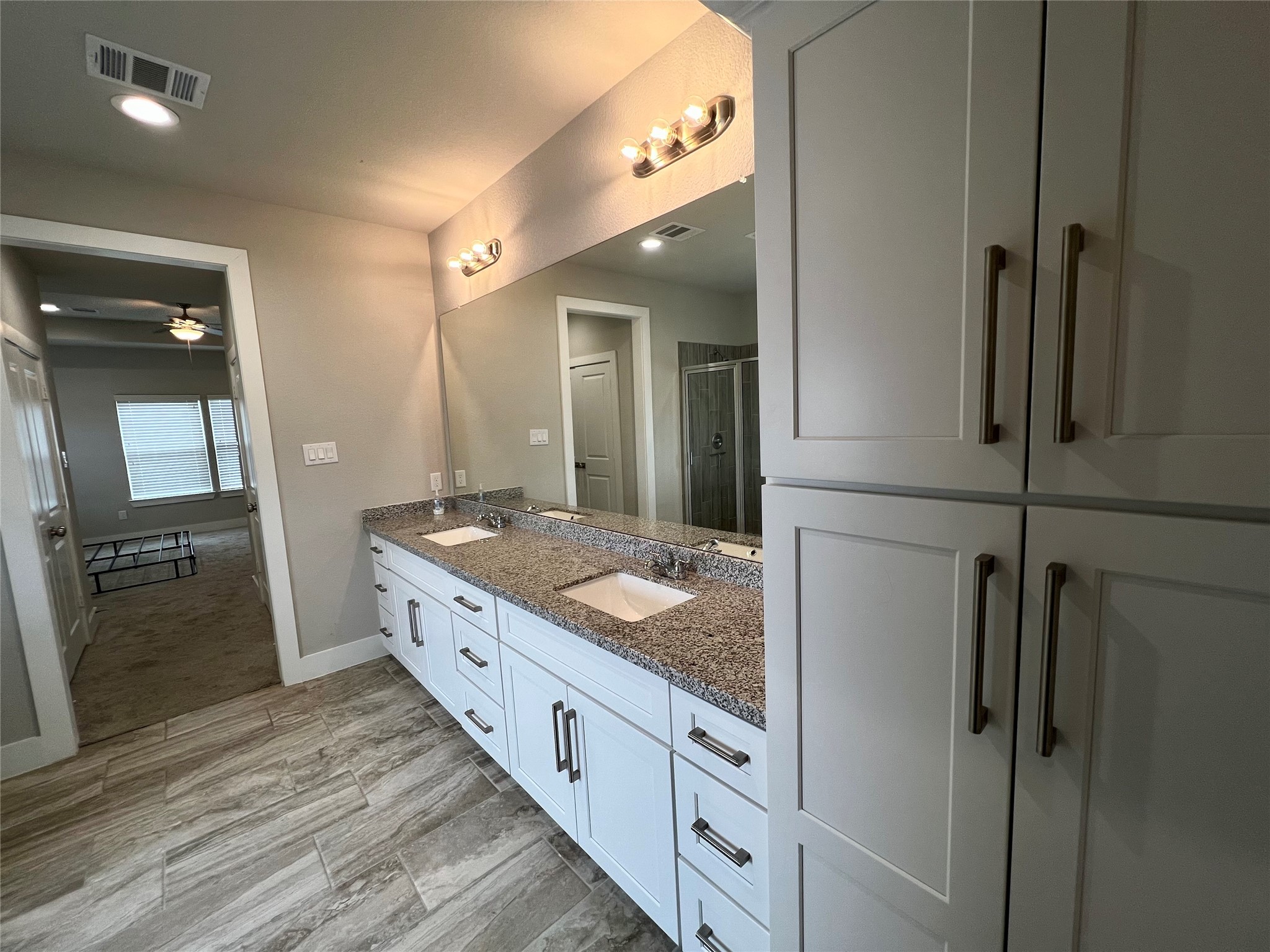 4301 Clover Street Houston, TX 77051 - Photo 20 of 31 Extra storage cabinetry and double vanity.