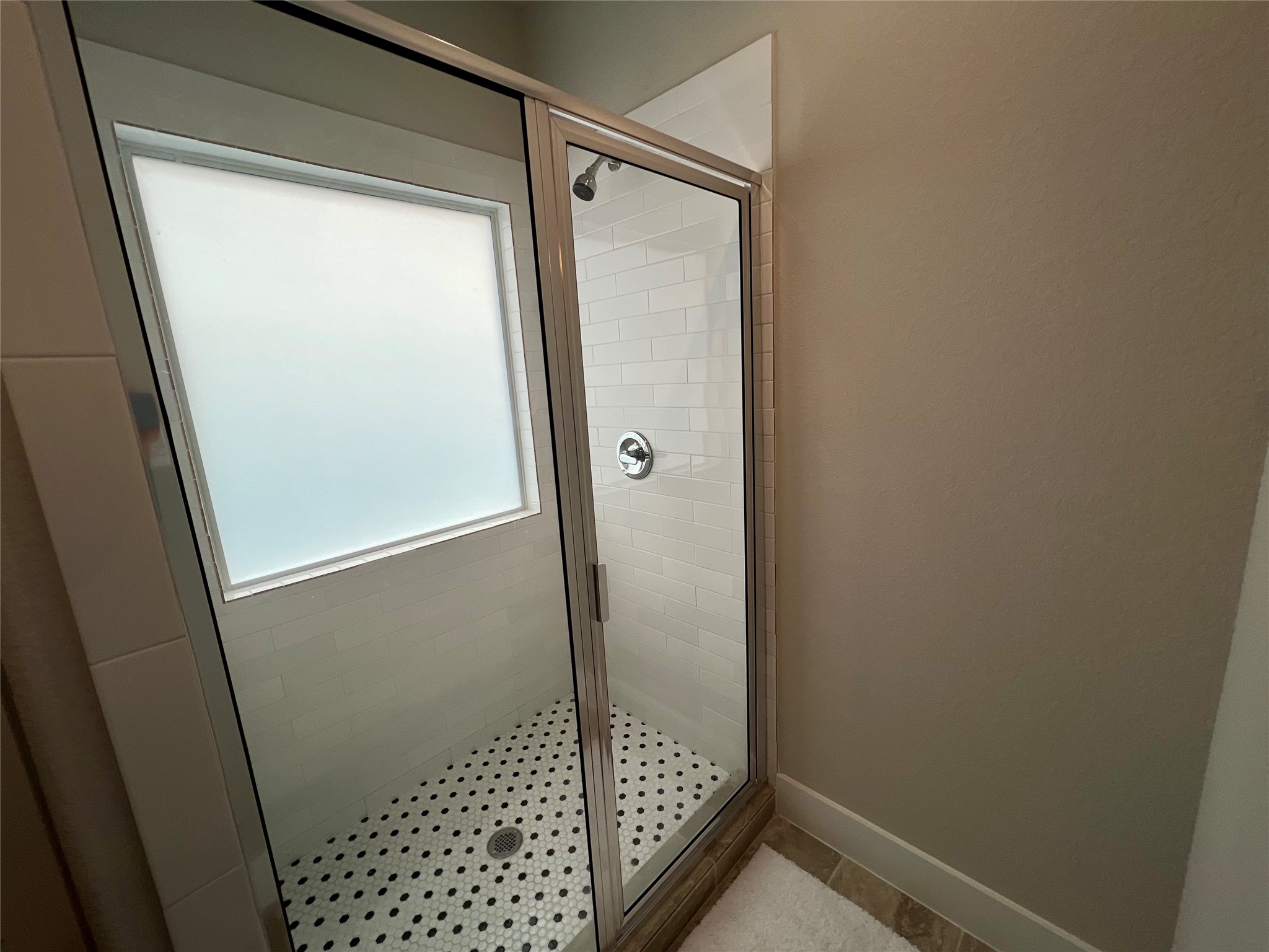 4301 Clover Street Houston, TX 77051 - Photo 22 of 32 a bathroom with a glass door shower and a sink