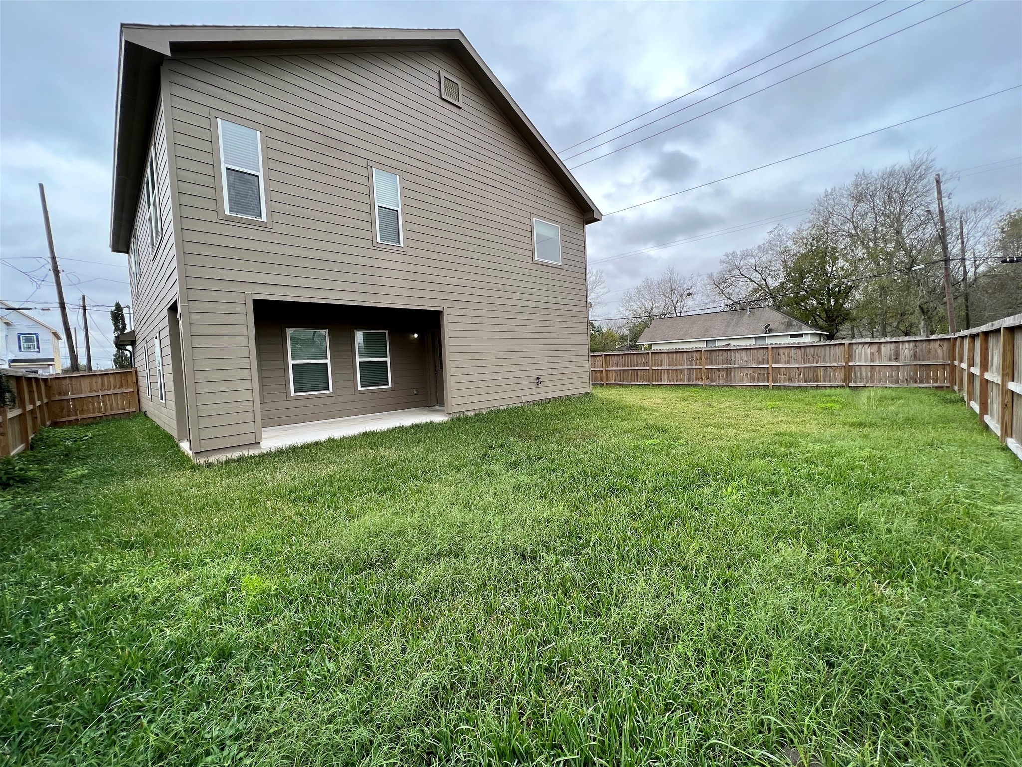 4301 Clover Street Houston, TX 77051 - Photo 32 of 32 a view of a backyard with a garden