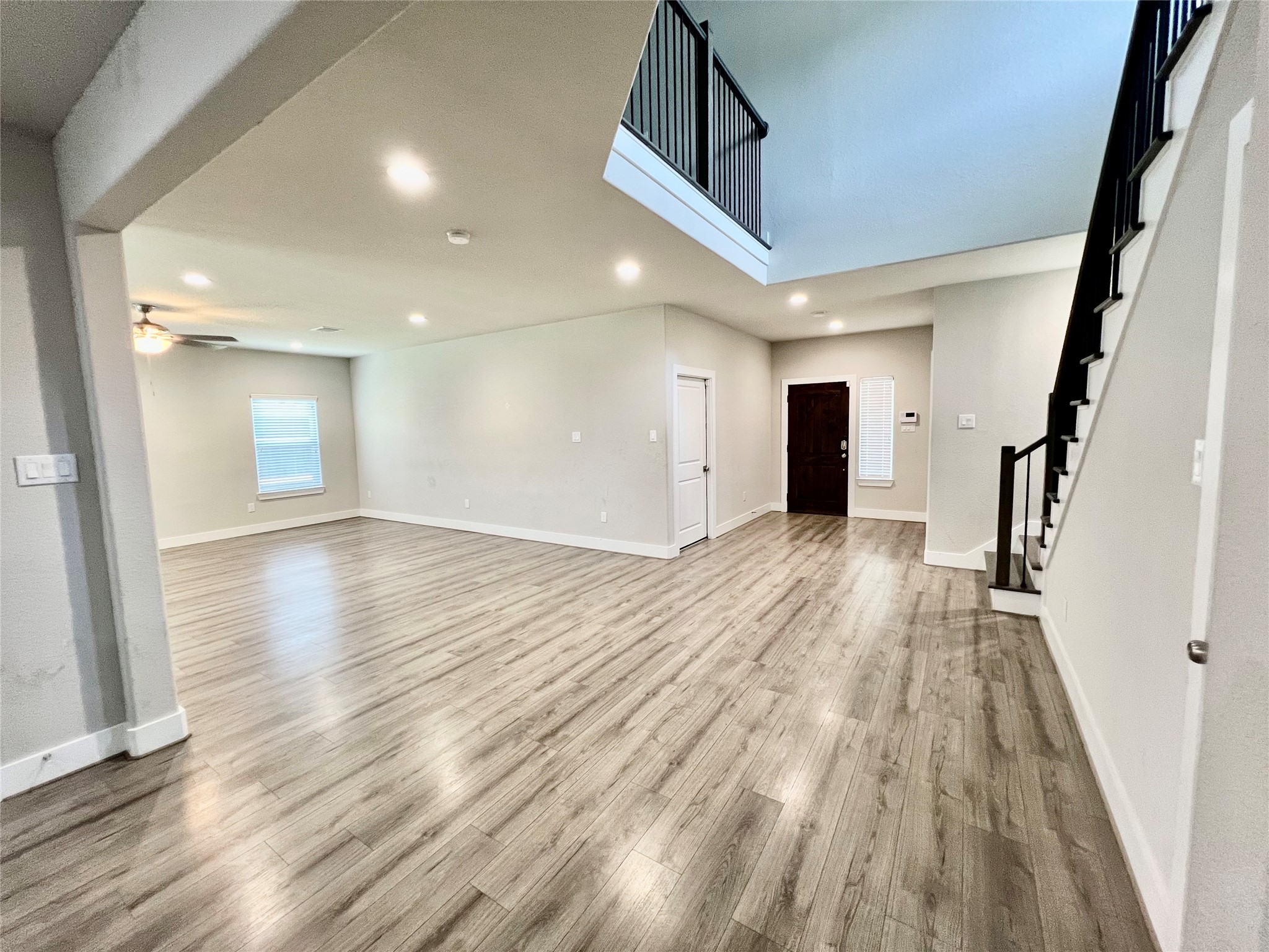 4301 Clover Street Houston, TX 77051 - Photo 6 of 31 a view of a hallway with wooden floor and staircase