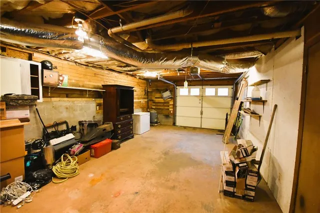 a view of a room with wooden door