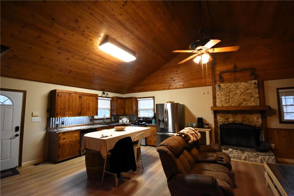 1968 Allgood Church Road Temple, GA 30179 - Photo 5 of 43 a living room with furniture a fireplace and a flat screen tv