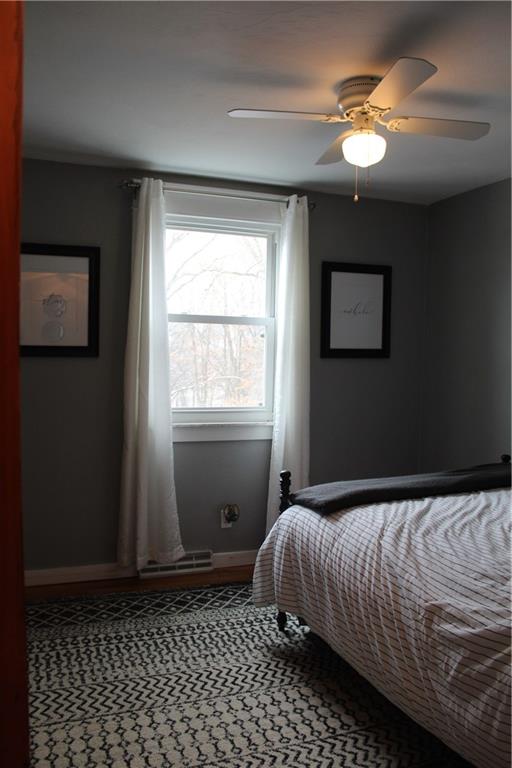 244 Rider Church Road Butler, PA 16001 - Photo 11 of 17 a bedroom with a bed and a window