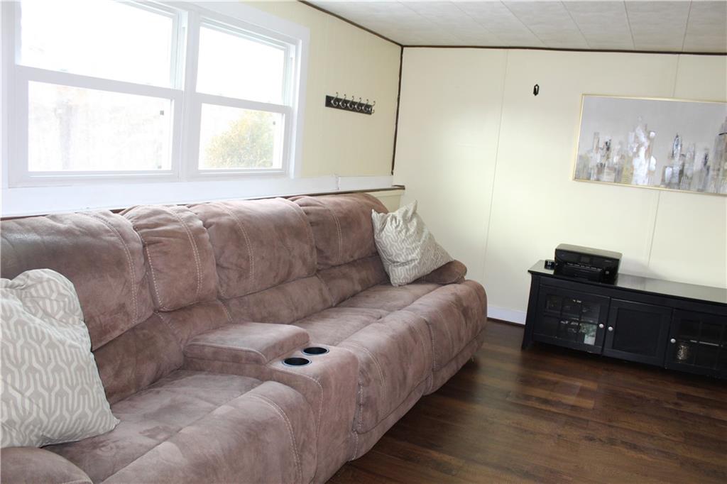 244 Rider Church Road Butler, PA 16001 - Photo 15 of 17 a living room with furniture and a window