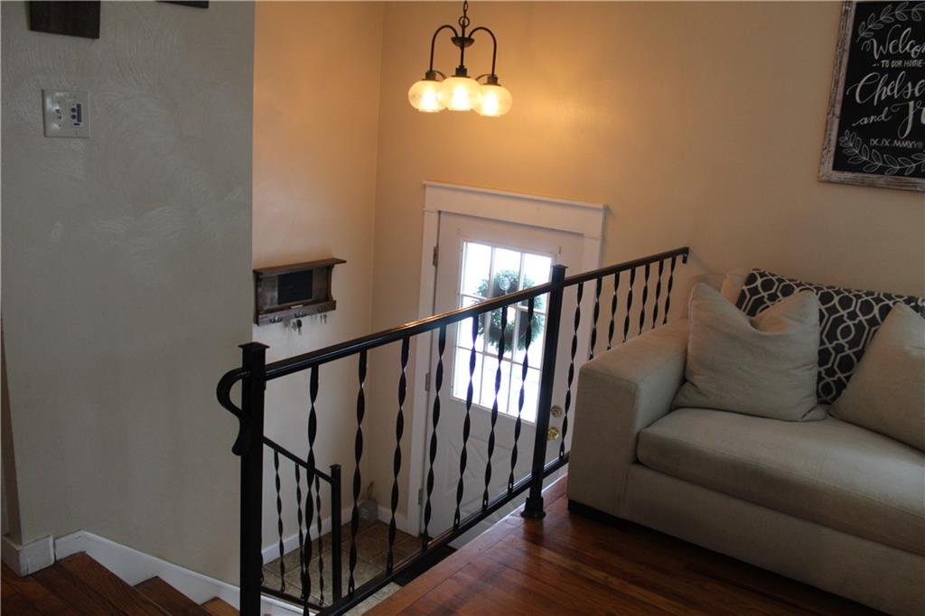 244 Rider Church Road Butler, PA 16001 - Photo 6 of 17 a living room with furniture and wooden floor