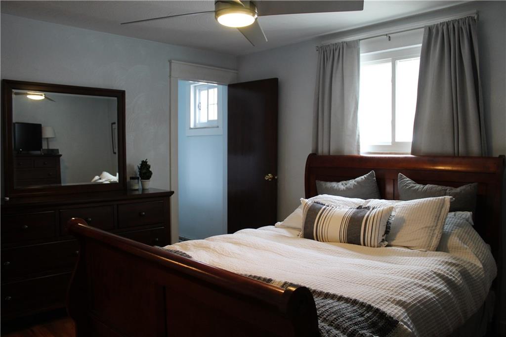 244 Rider Church Road Butler, PA 16001 - Photo 8 of 17 a bedroom with a bed and a dresser